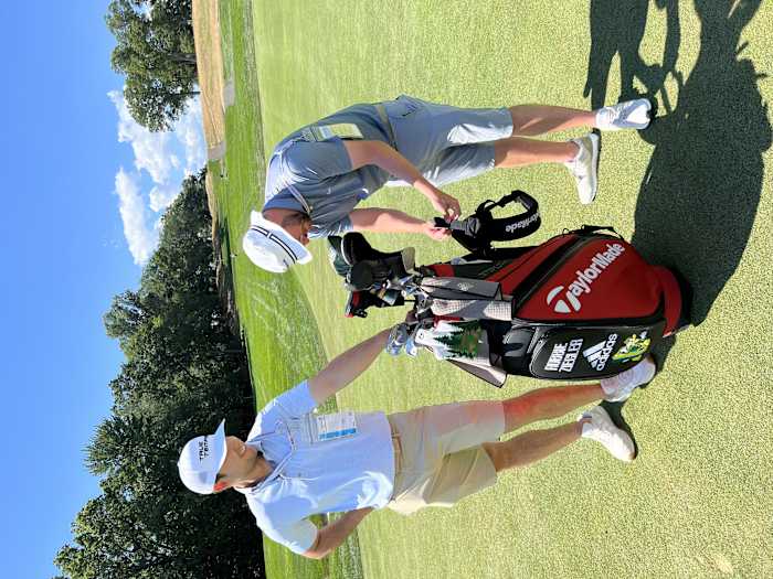 A TaylorMade staffer attached a second strap to Robbie Ziegler's golf bag at the 2022 U.S. Amateur.